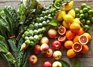 a group of fruits and vegetables on a wood surface Healthy Weight Loss Diets Tipton